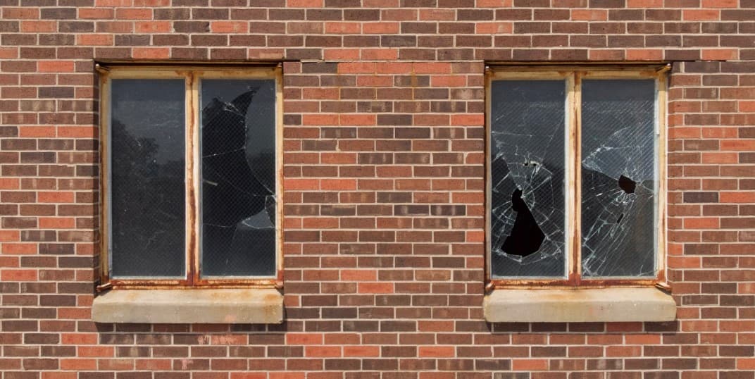 Shadows of Neglect: How Dark Streets Mirror Broken Windows